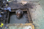 Man hole scavening deep in sewage